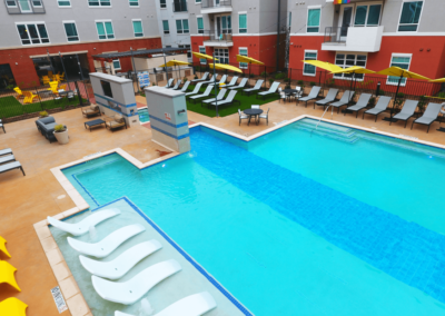 outdoor pool area at liv+ arlington apartments